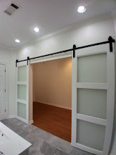 Custom interior sliding barn doors installed in a Memphis home renovation